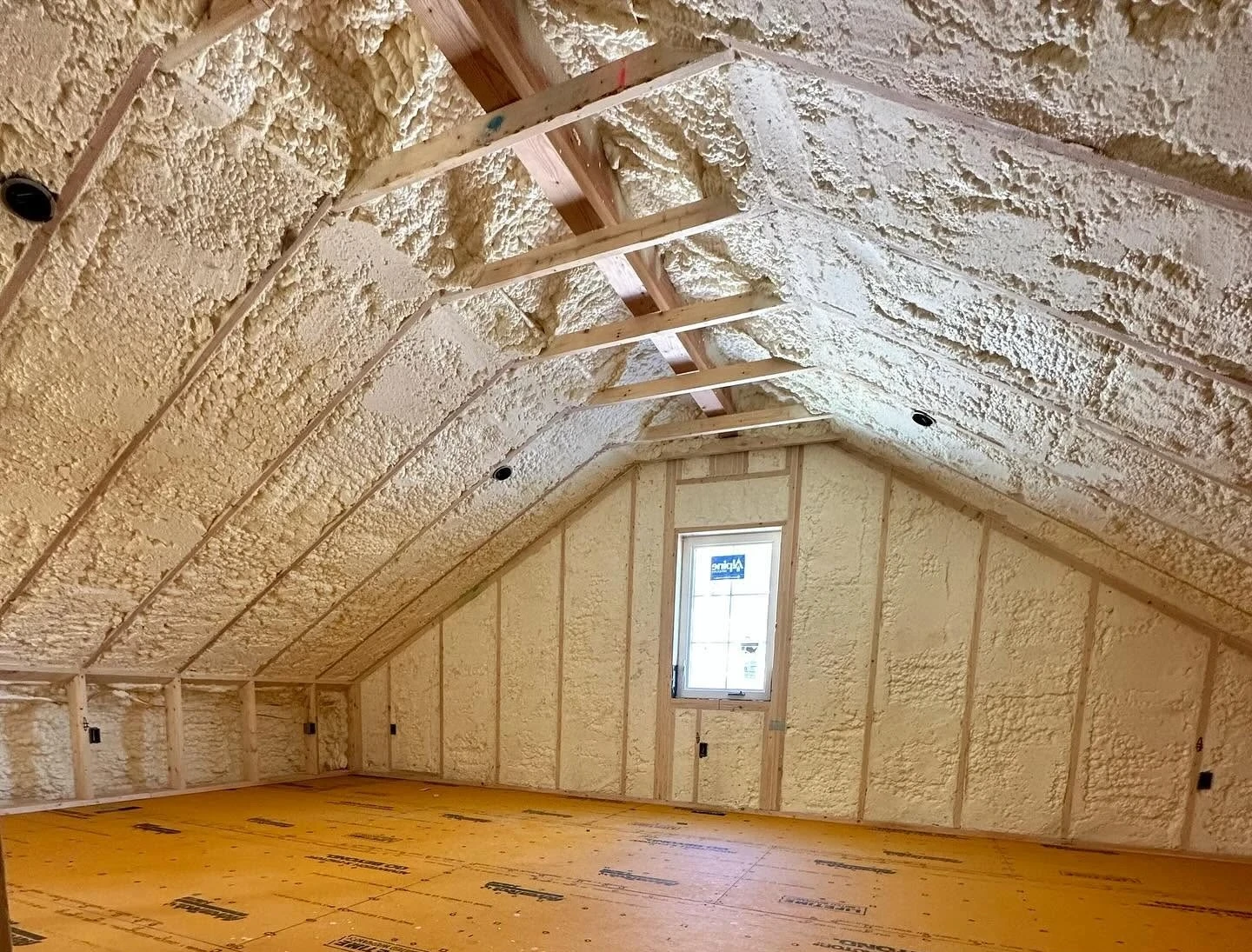 How Does Spray Foam Insulation Support Better Attic Space Performance Around Rafters in Tanaina AK Homes